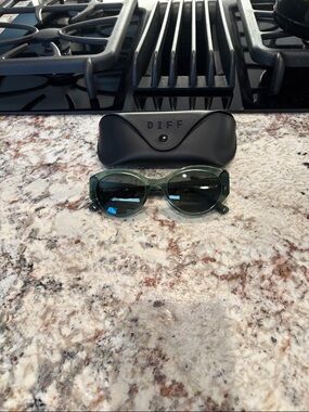 Green Oval Sunglasses by DIFF with Black Case